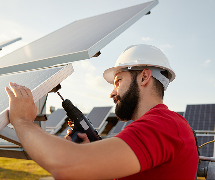 Technician Working on Solar Panel